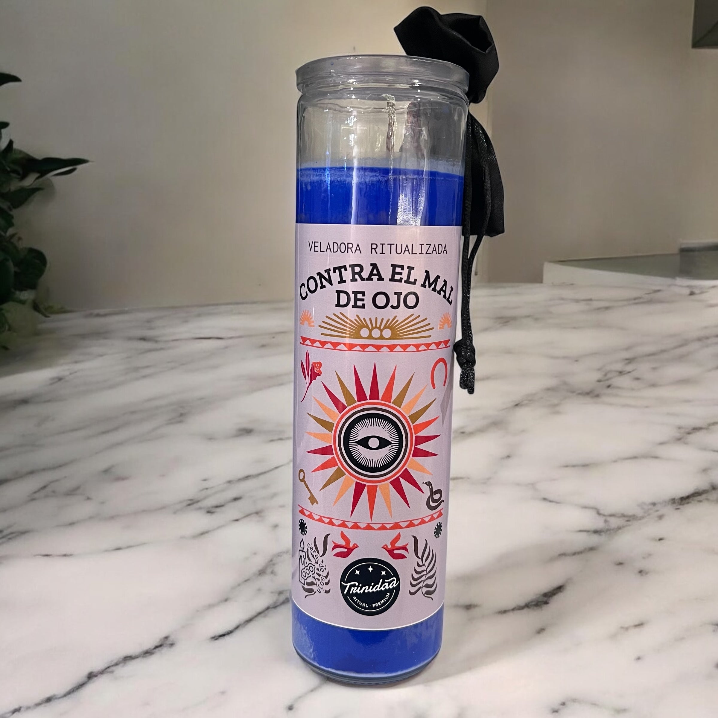 Bougie ritualisée contre le mauvais œil en verre